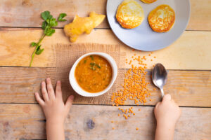 child with soup