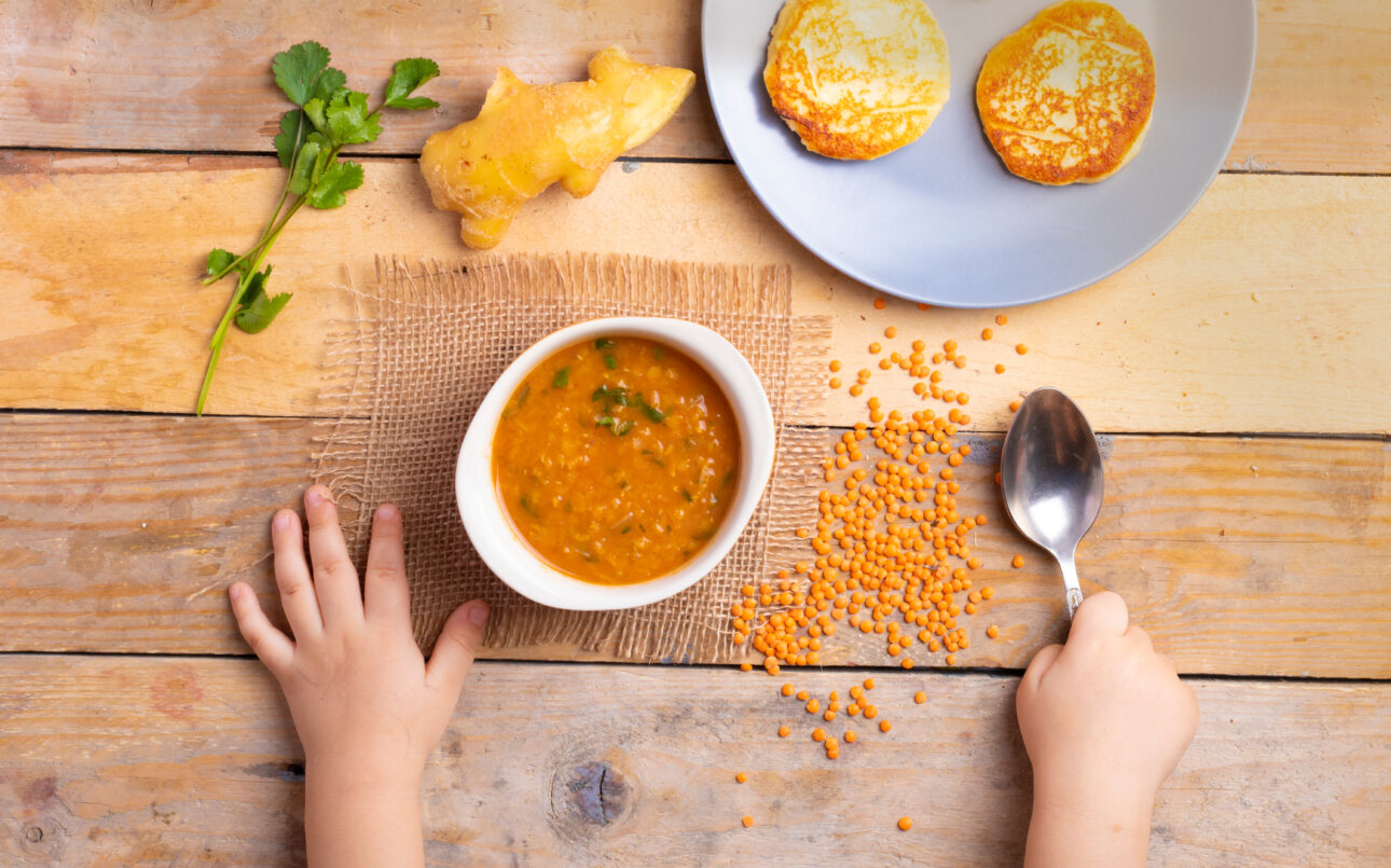 child with soup