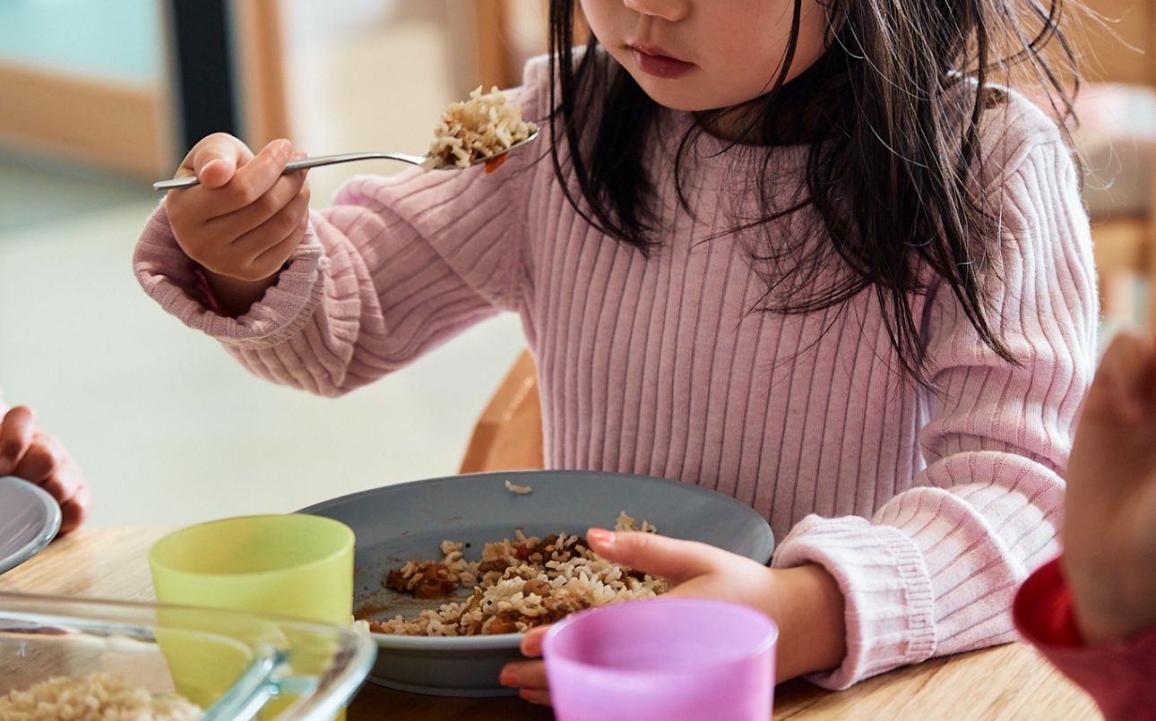 young girl eating