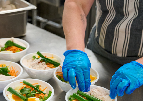 Serving chicken vegetable bowls