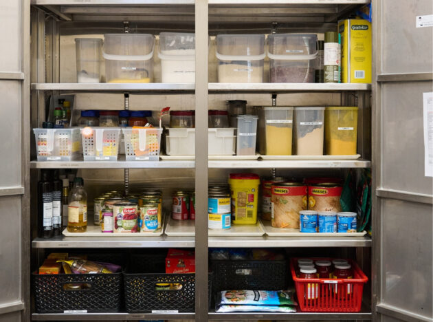 Photo of cupboard full of ingredients in containers