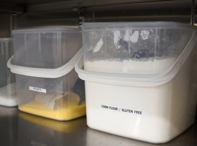 Corn flour and polenta in separate big containers