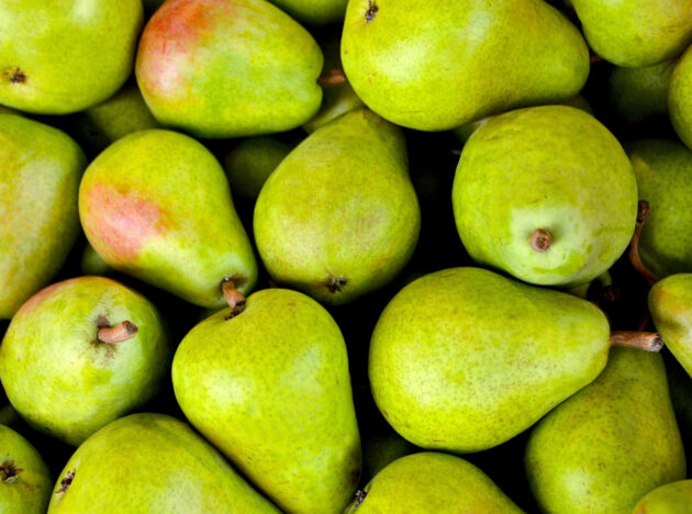 Green pears with a touch of red