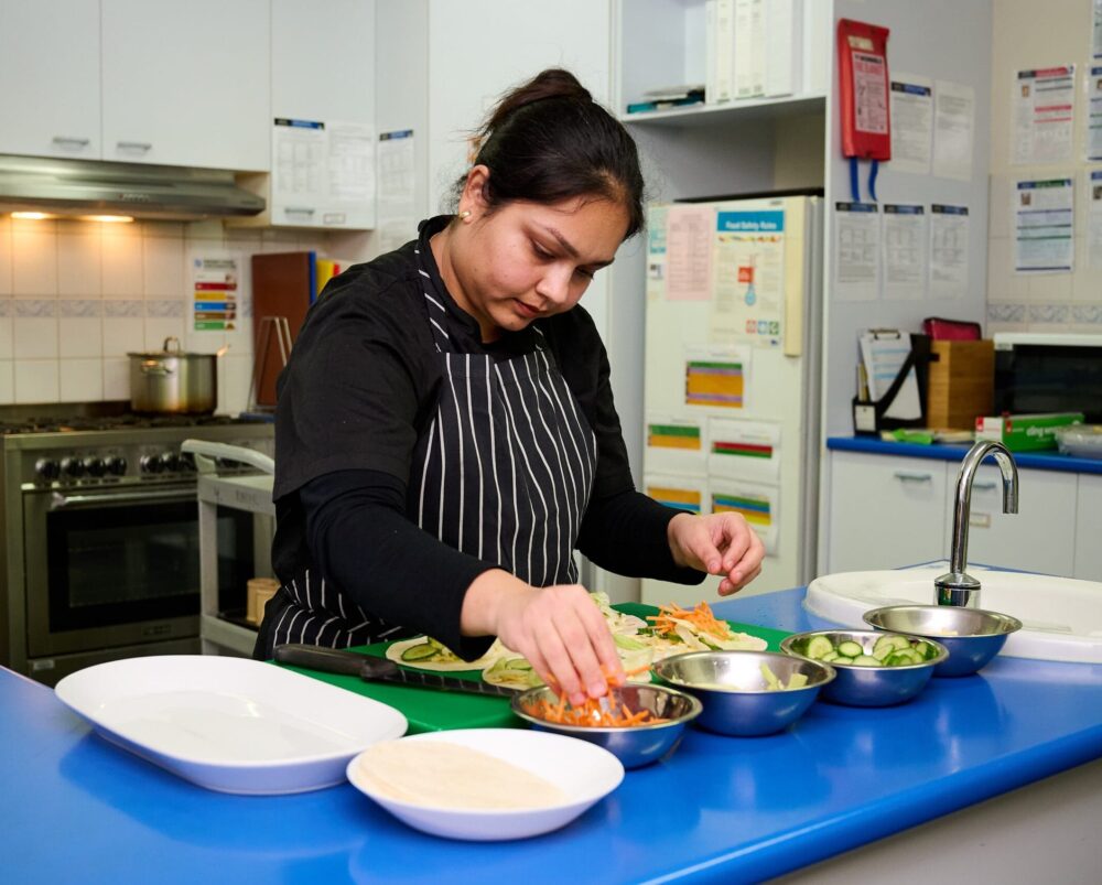 Chef carefully selecting ingredients in kitchen
