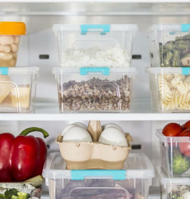 various food containers stored in a fridge