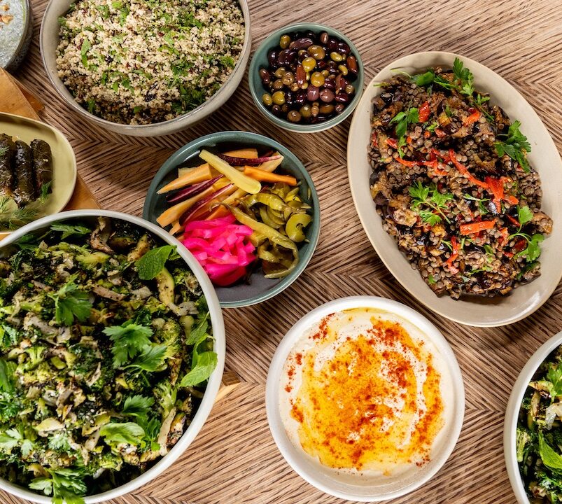 Table of bowls with mixed salads
