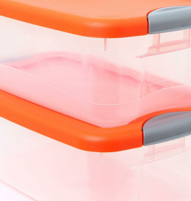 two orange food container stacked on each other