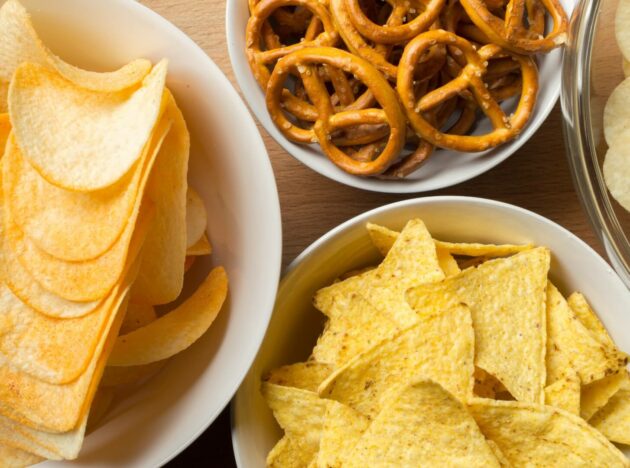 selection of savoury snacks in bowls
