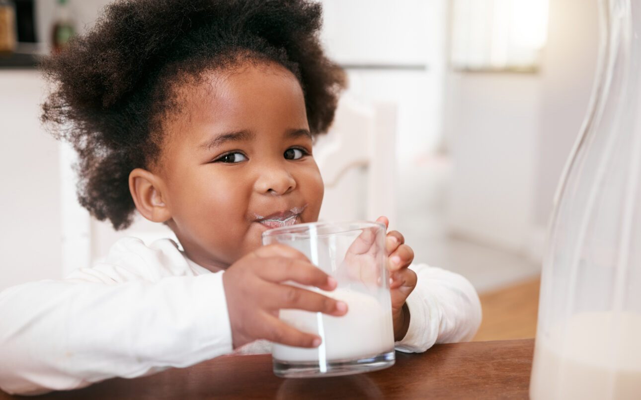 child drinking milk