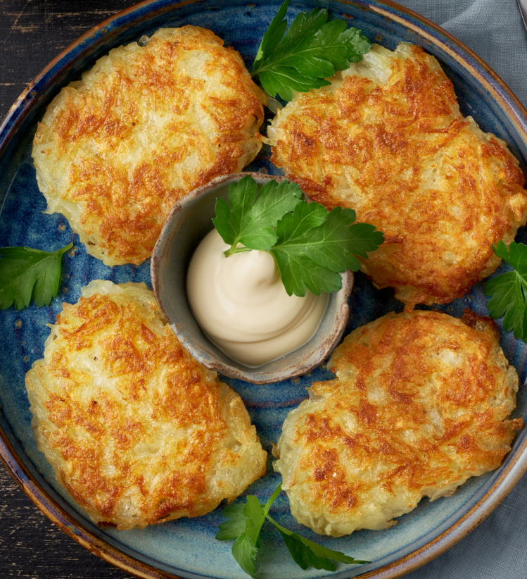 four cauliflower hashbrowns served mayonnaise