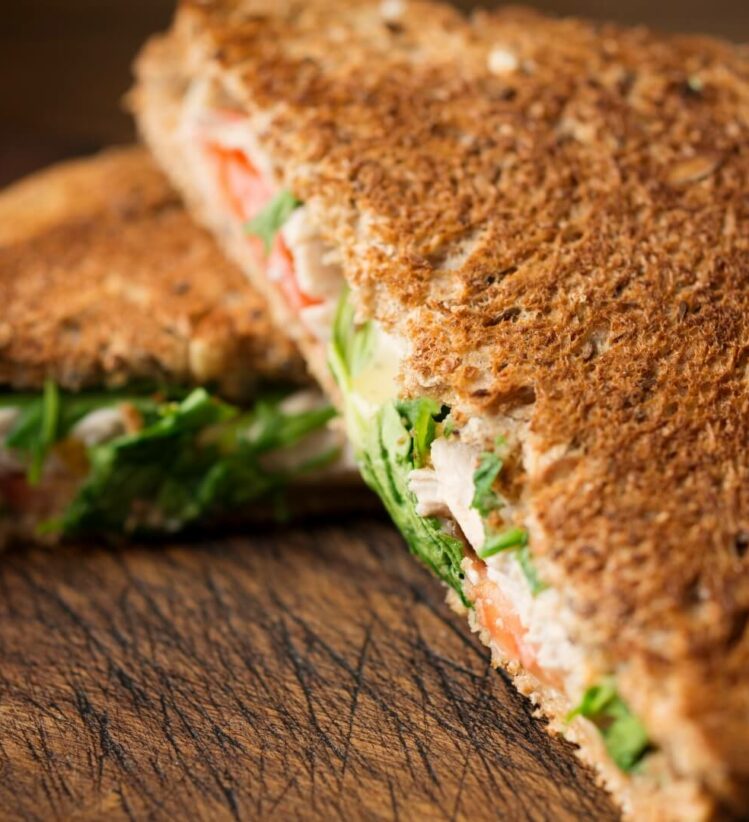 a chicken waldorf toasty cut into triangles