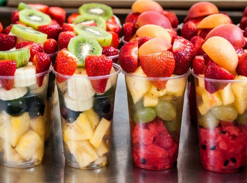 cups with various combinations of fruit salad