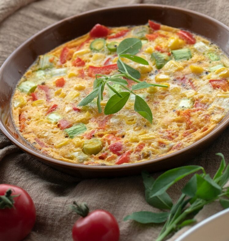 Potato, corn and capsicum frittata in a pan
