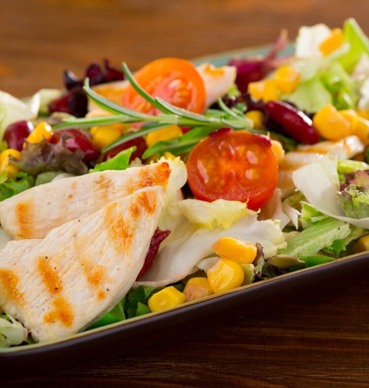 Chicken and salad in a bowl