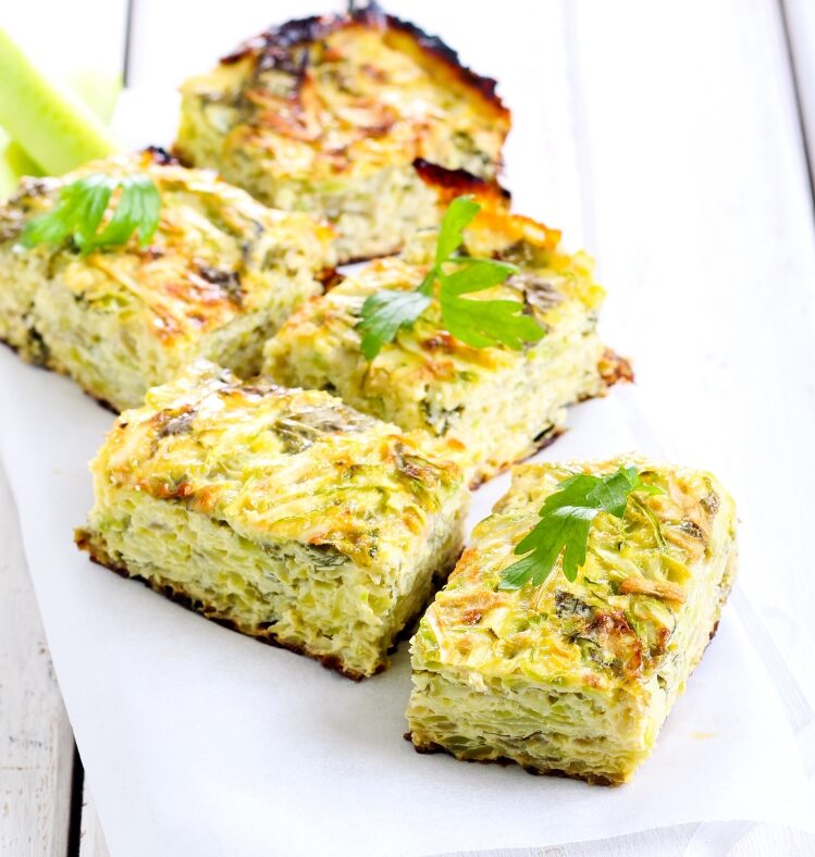 Three slices of a vegetable loaf on a plate
