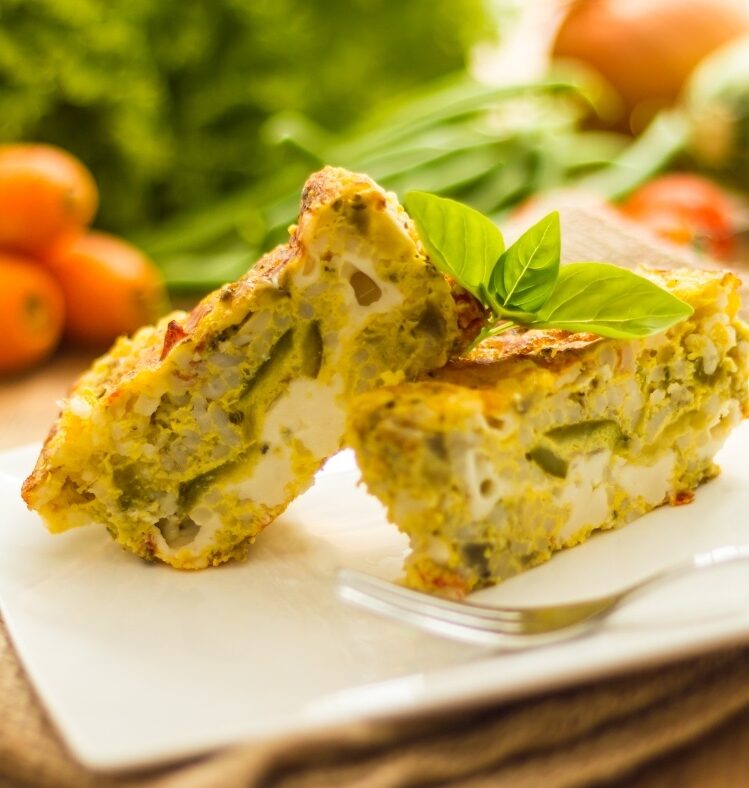 zucchini slice with feta on plate